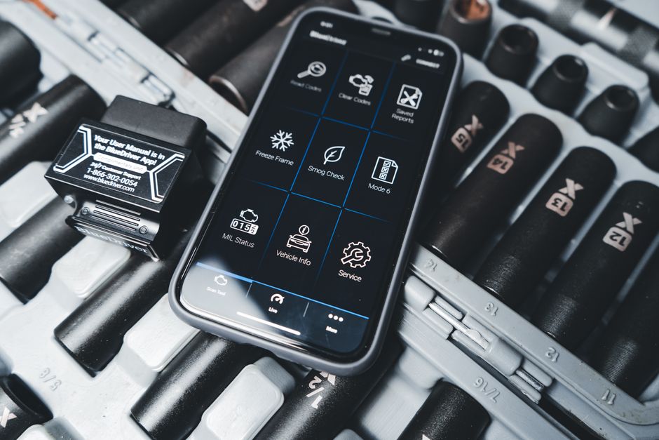 OBD2 diagnostic scanner displaying transmission fault codes